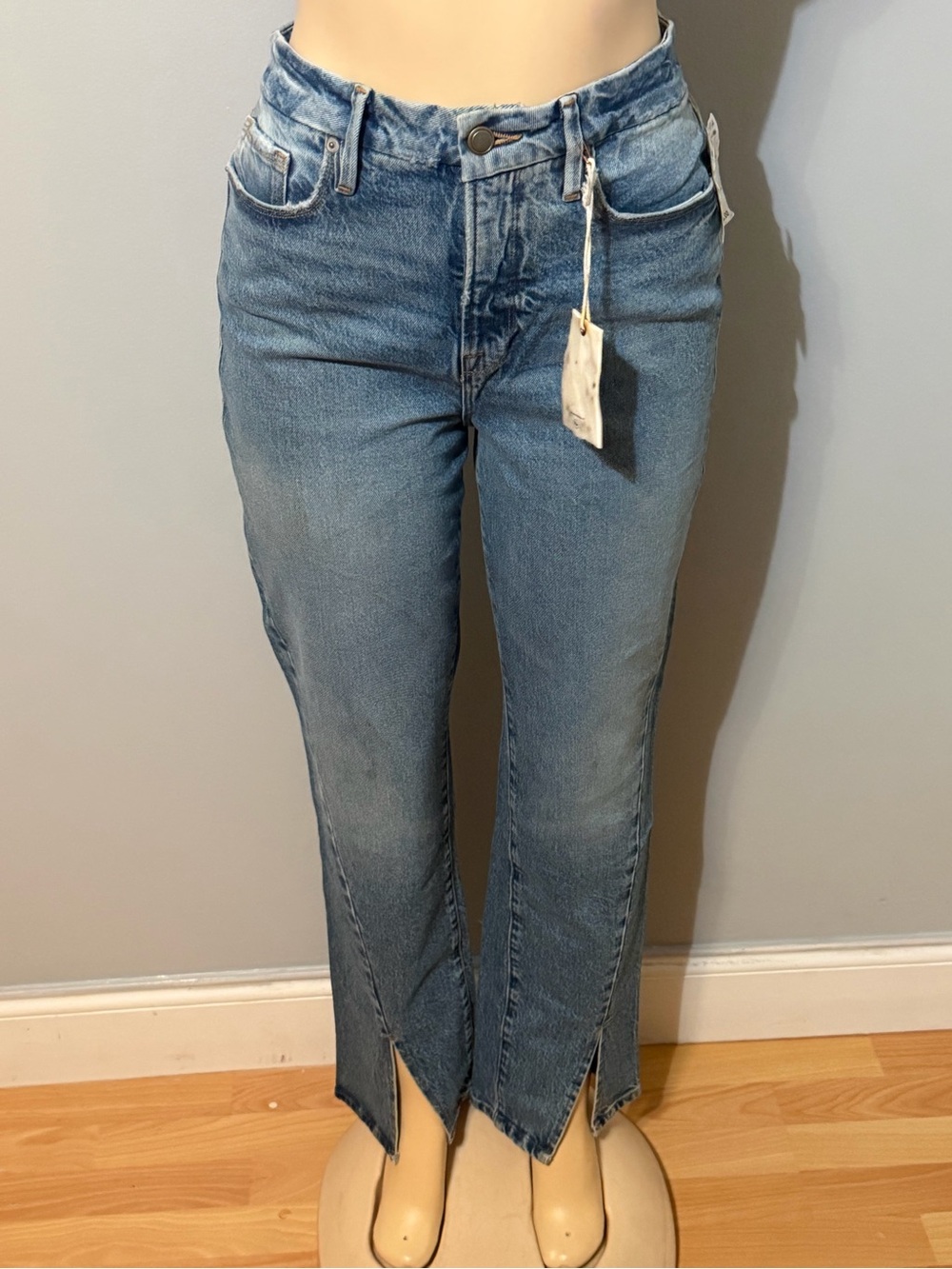 Good American Light Blue Straight Leg Jeans with Front Slit Hem
